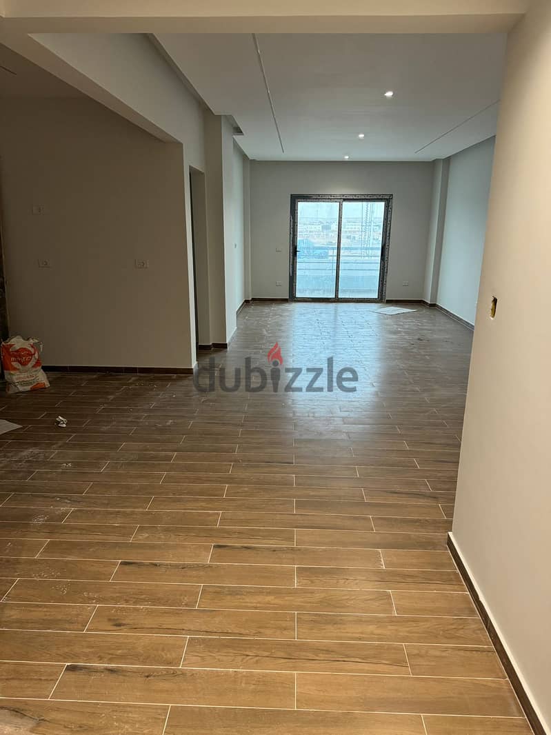 apartment for sale 200m fourth floor fully finished prime location  in the Sourthen Lotus infront of Emaar Mivida under market price 2