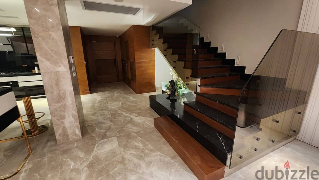 twin house at Emaar Mivida New Cairo اعمار ميفيدا   fully finished with furniture very prime location for sale 10