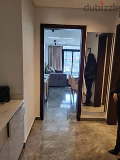 A fully finished hotel apartment for sale with air conditioners on Al Thawra Street directly from Marriott Residence Heliopolisشقة فندقية للبيع
