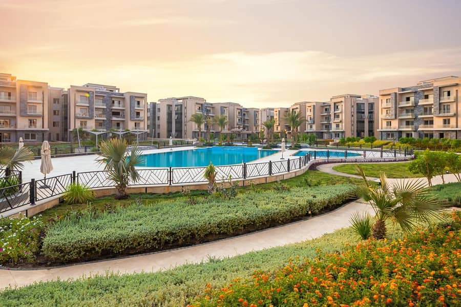 "Own your fully finished apartment for immediate delivery in Galleria Moon Valley compound, Fifth Settlement, with green spaces, landscape, and club 1