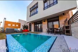 Duplex villa for sale in New Cairo | Trio Gardens | Nawadi Street in golden square beside MV icity and palm hills with flexi finishing & smart system 0