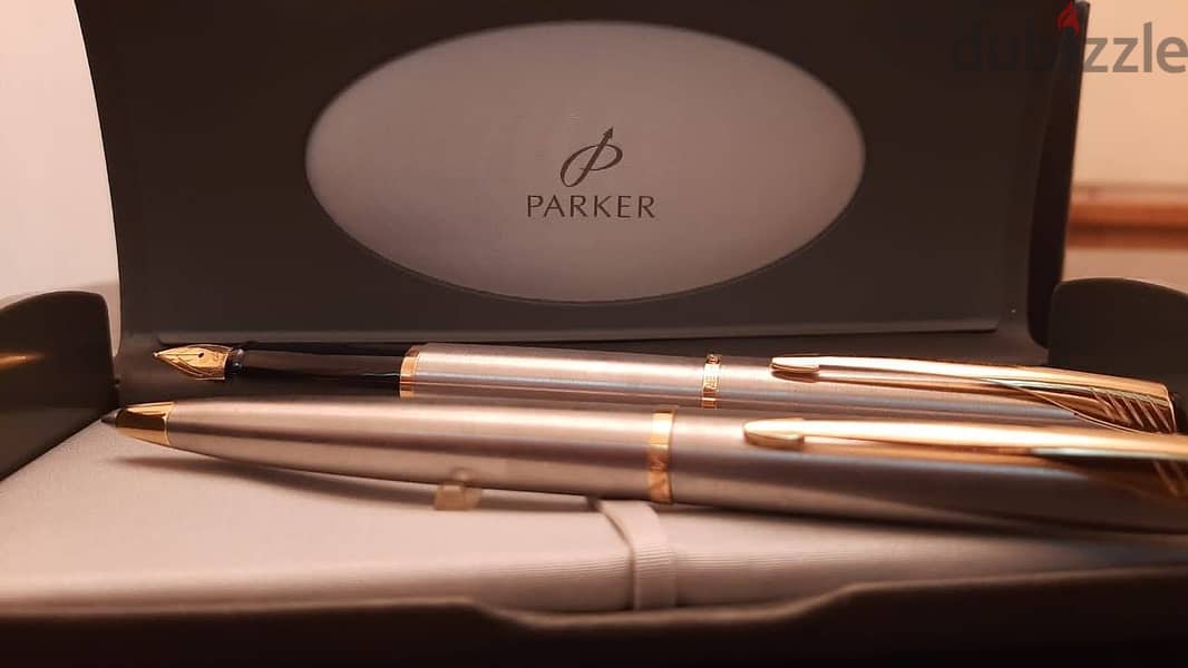 طقم أقلام ( Parker ) أصلي حبر وجاف بالعلبة الأصلية جديد لانج لم يستخدم 7