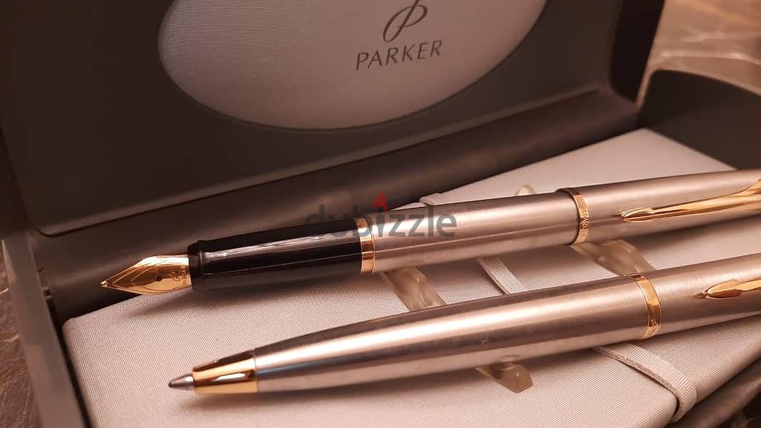 طقم أقلام ( Parker ) أصلي حبر وجاف بالعلبة الأصلية جديد لانج لم يستخدم 9