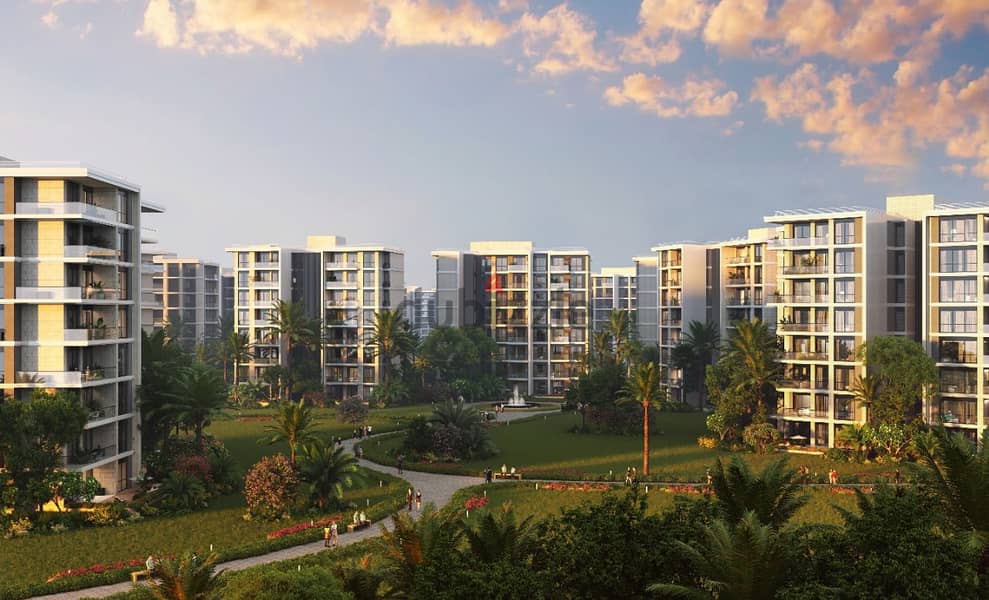 An apartment for sale in Noor Smart City with capital gardens. 1