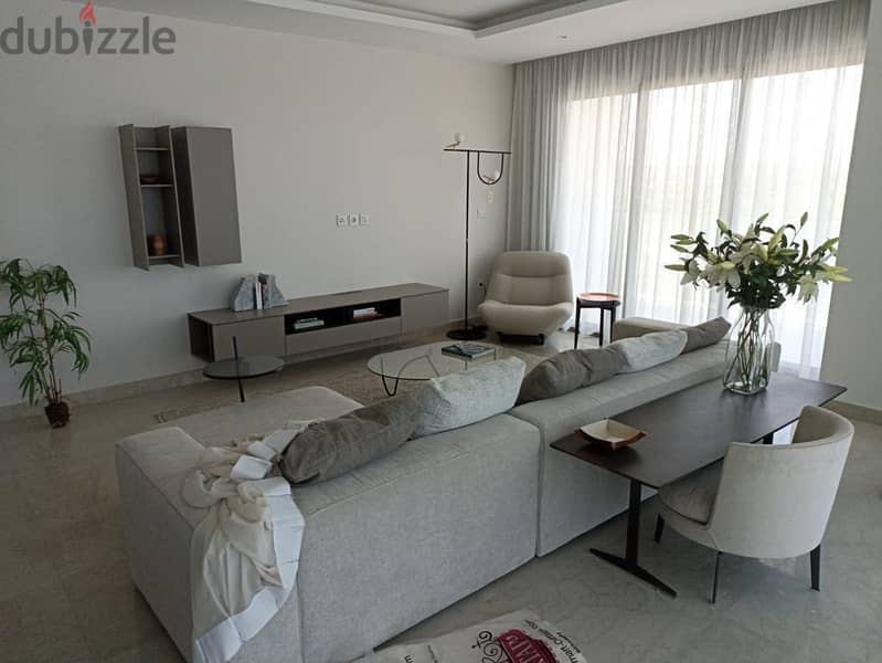For sale, a fully finished, double-view nautical apartment with air conditioners in Zed West Naguib Sawiris Towers, Sheikh Zayed, minutes from Hyper O 2