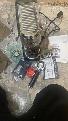 barely used Delonghi Espresso Coffee making machine مكنة قهوة اكسبرسو