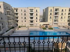 semi furnished Apartment 2rooms for rent in Mivida Boulevard view pool 0