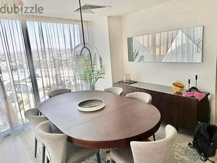 Apartment for sale in Zed Towers, luxuriously finished, ACs and kitchen, in a strategic location in Sheikh Zayed, next to Al Rabwa 2