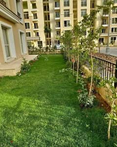 A 4-bedroom apartment with a garden of 111 square meters with a Bonarme view on the landscape in Sarai, next to the cities of Sarai and New Cairo.
