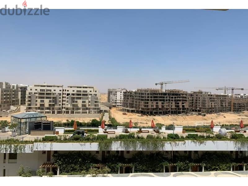 Apartment ready to move 170 m, with the best location and the lowest price, in Mountain View iCity Compound, New Cairo. 1