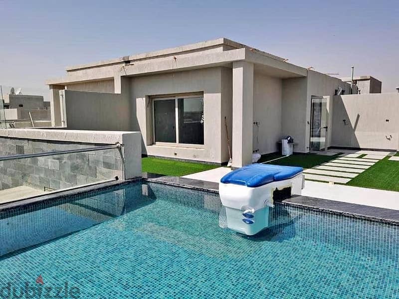 A finished villa with air conditioners + private garden in the Fifth Settlement, directly in front of Hyde Park 7