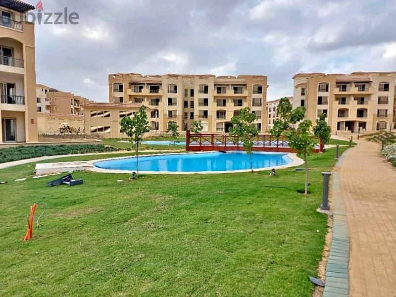 Apartment for sale with distinctive view 140m in Stone Park West Golf Compound with installments over 7 years 8