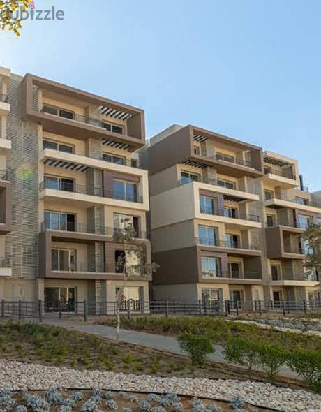 Palm Hills New Cairo Apartment with garden corner for sale 1