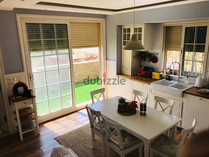 Ground floor apartment with garden for sale (comfortable installment plan) in front of Cairo Airport 1