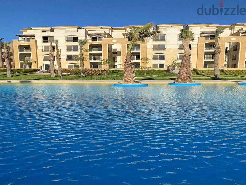 ready to move with equal installments in the heart of the Fifth Settlement with a private roof area of 92 meters in Stone Residence 4