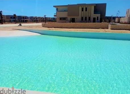 Finished chalet with air conditioners and kitchen for sale in the North Coast, Azha Village, Azha North Coast, first row, lagoon 5