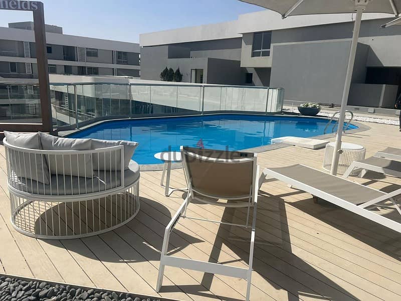 Apartment for sale with a down payment of 893,000, 10-year installments, with a distinctive view in Bloomfields Mostakbal City, developed by Tatweer M 5