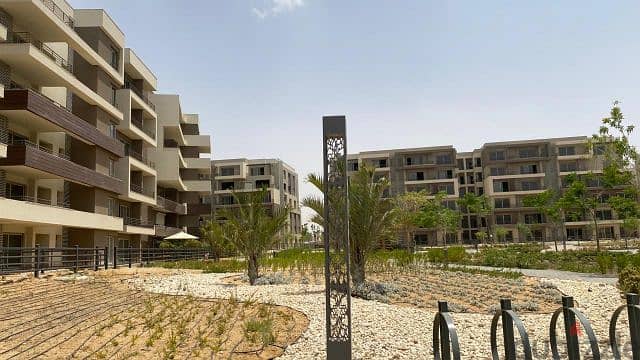 For sale in installments, a finished studio with air conditioners, in a prime location overlooking Palm Hills villas, New Cairo 7