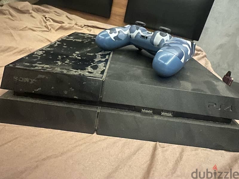 Ps4 with 2 controllers and games 1