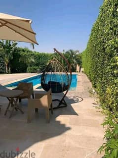 Stand Alone Villa for sale in New Cairo in Sarai Compound, area of ​​198 m, garden of 212 m and roof of 44 m, very distinctive division