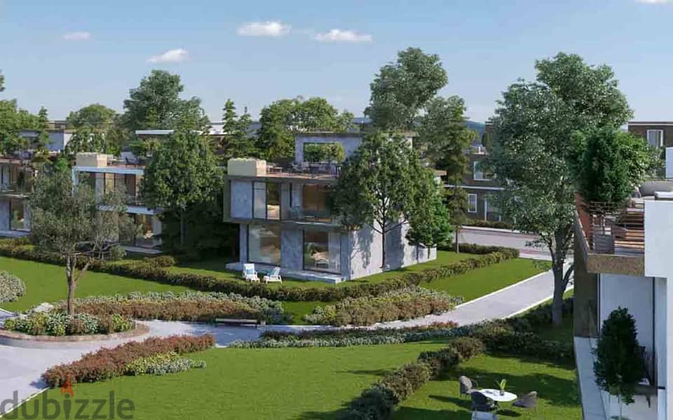 Townhouse villa for sale in Mostakbal City from Tatweer Misr | Il Bosco City | with pentouse + swimming pool view and a panoramic view of lagoon 1
