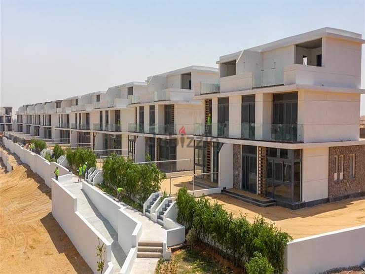 Townhouse villa for sale in Mostakbal City from Tatweer Misr | Il Bosco City | with pentouse + swimming pool view and a panoramic view of lagoon 3