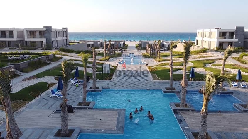At a competitive price + the longest repayment period. . A luxury independent villa for sale in installments on the North Coast of Ras Al-Hikma 12