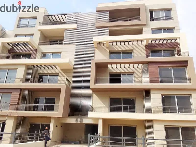 for sale apartment with garden prime location with installment in palm hills new cairo 13