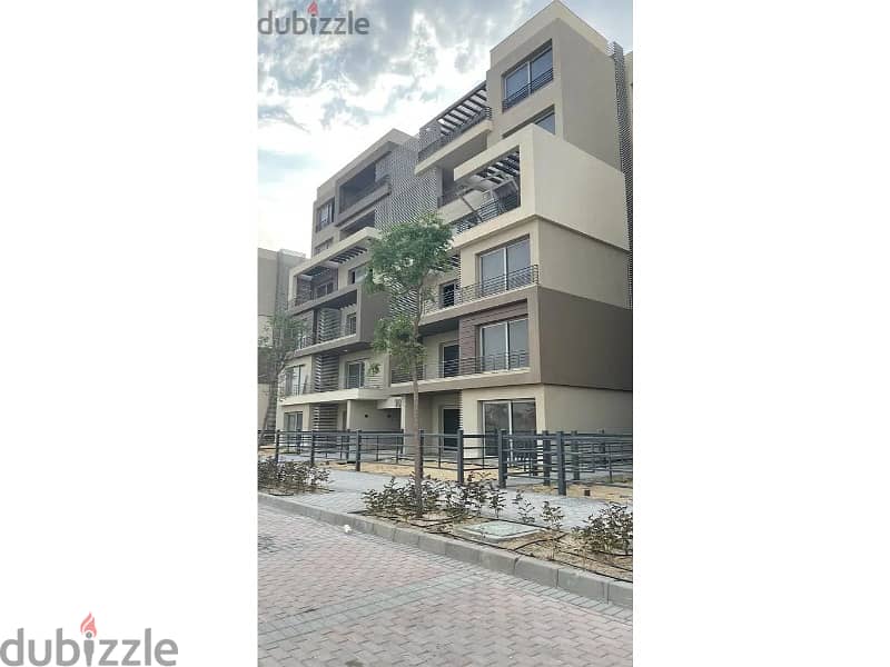 for sale apartment with garden prime location with installment in palm hills new cairo 17