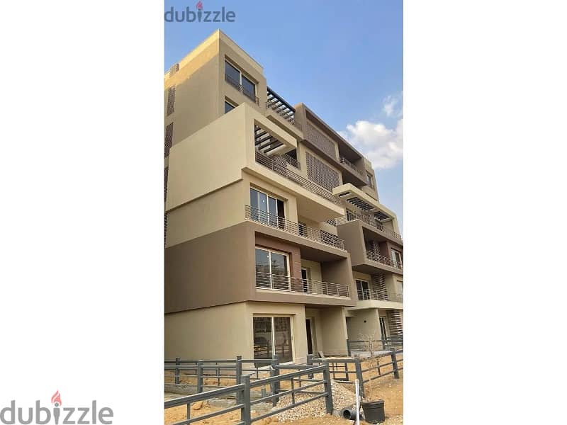 for sale apartment with garden prime location with installment in palm hills new cairo 18