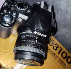 Nikon d3100 + Nikon lens 50mm 0