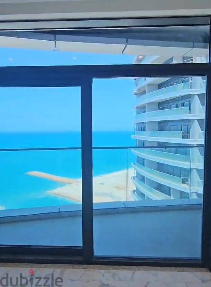 a direct sea view studio for sale in alamein towers north coast 1