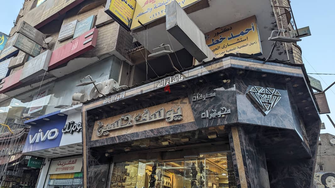محل تجاري للبيع و مطل على ميدان ترسا و ش عثمان محرم بالطالبية الرئيسي 3