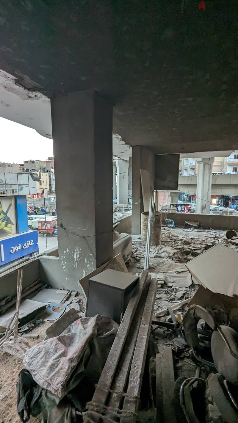محل تجاري للبيع و مطل على ميدان ترسا و ش عثمان محرم بالطالبية الرئيسي 11