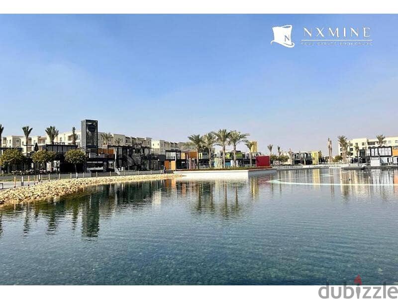 Apartment for sale Overlooking Lake District in Compound Mivida View Central Park and Lake شقة ا للبيع فى ميفيدا تشطيب سوبر لوكس 1