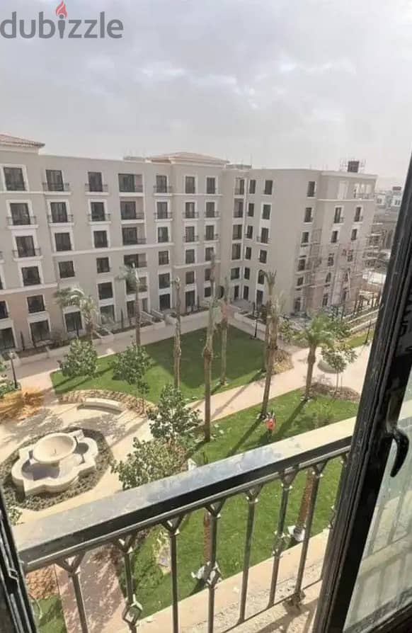 Apartment for sale in the heart of Sheikh Zayed, near Hyper One, in Village West Compound by Dora, fully finished, large area, 4 bedrooms 1
