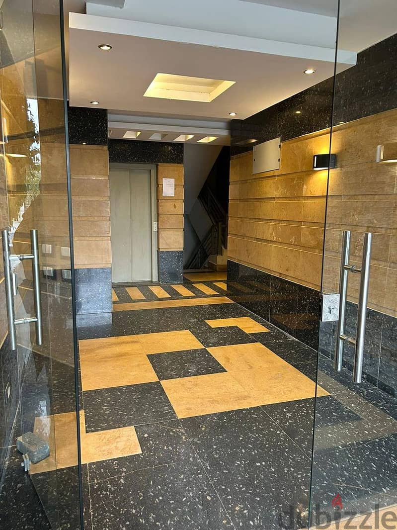 The lowest price for two rooms in Taj City, a distinctive area apartment in front of Cairo Airport, 114 square meters, fifth floor for sale with a dow 1