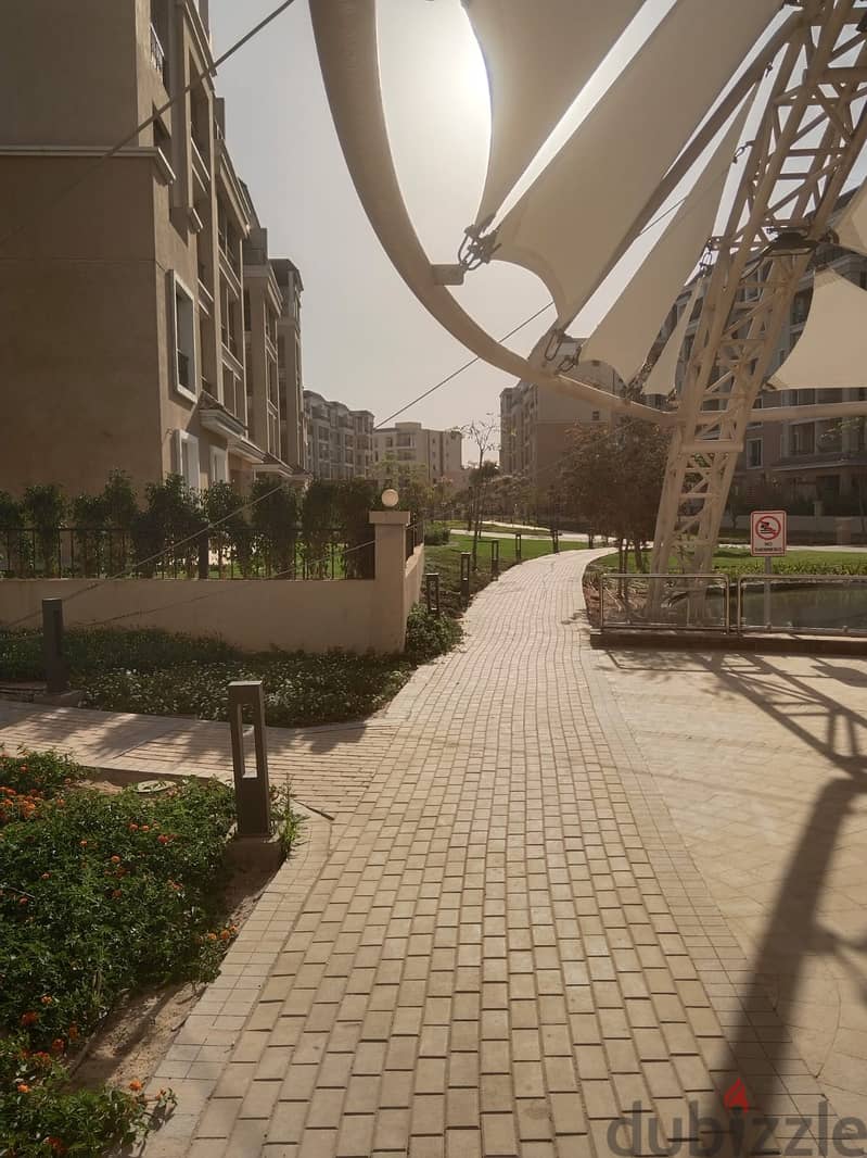 147 sqm apartment, ground floor, 123 sqm garden, lake view, Sarai Compound, New Cairo, Sur, Madinaty wall, 880,000 down payment 28