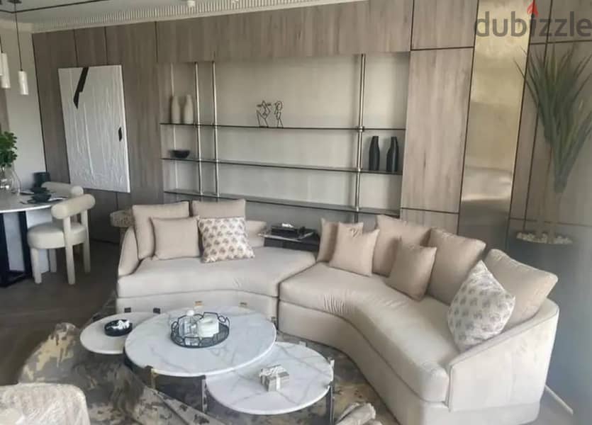 Apartment with garden (immediate receipt + finished with AC'S) for sale in the Fifth Settlement, Al Marasem Fifth Square Compound 4