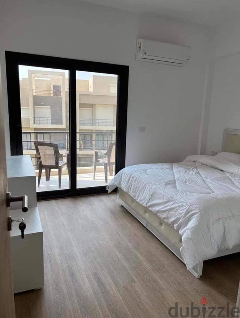 Apartment with garden (immediate receipt + finished with AC'S) for sale in the Fifth Settlement, Al Marasem Fifth Square Compound 9