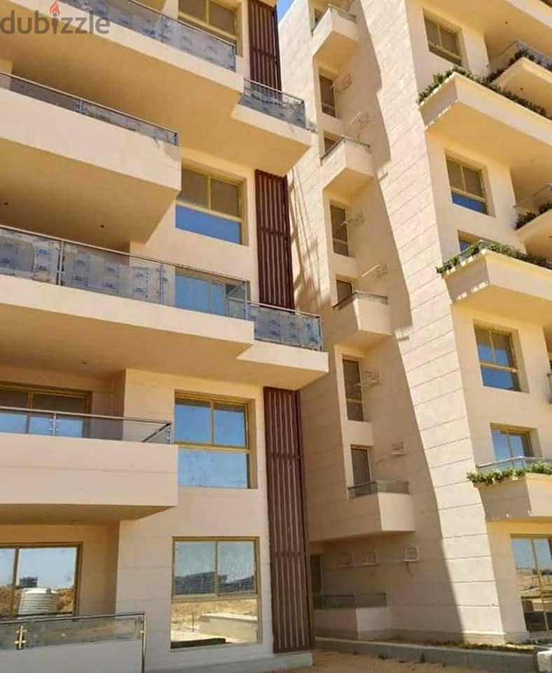 Apartment with private garden for sale in Sheikh Zayed, with a down payment of 888 thousand 5