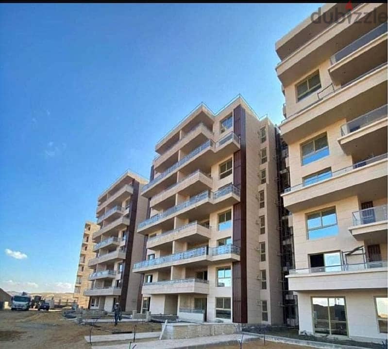 Apartment with private garden for sale in Sheikh Zayed, with a down payment of 888 thousand 6