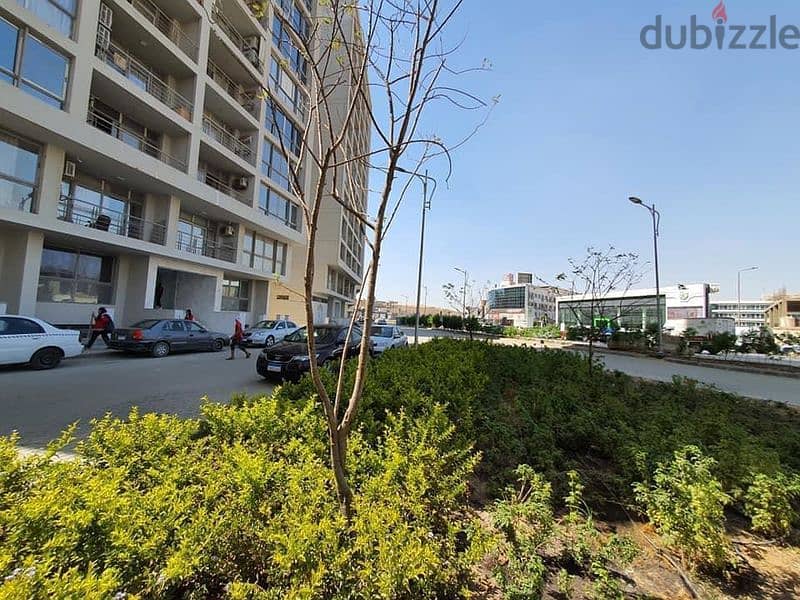 Apartment for sale, 100 meters, with a private garden of 15 meters, completed in installments, in One Katameya Compound 2