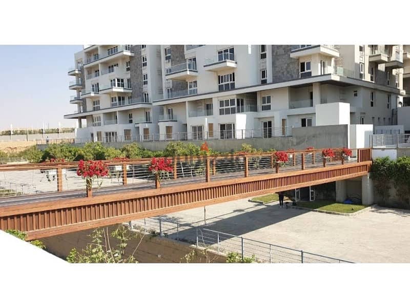 At the lowest price in Mountain View, own a fully finished apartment ready to move in a prime location with an open view and landscape 7