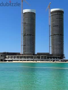 For Sale With Installments In Alamein Towers, 217 Sqm Apartment, Full Panoramic Sea View, Finished with Air Conditioners