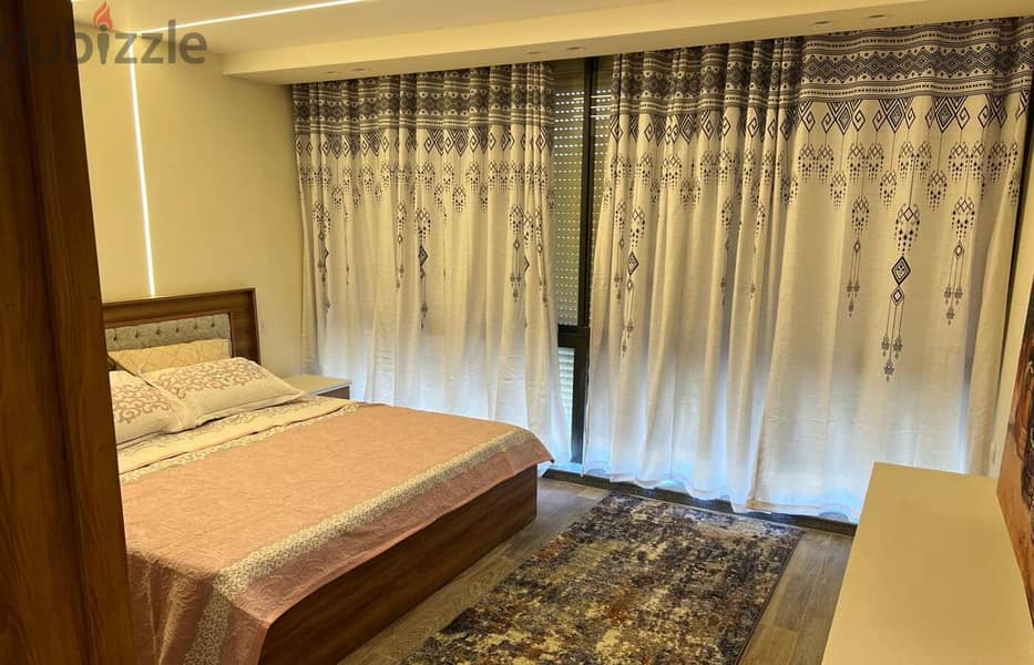 For rent at the lowest price, a modern furnished apartment with 2 rooms in Lake View Residence Compound, Fifth Settlement 5