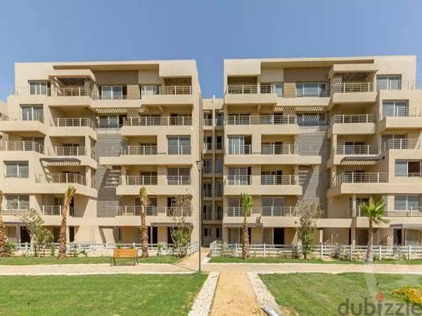 apartment with garden fully finished direct on lagoon , palm hills new cairo cleo 2