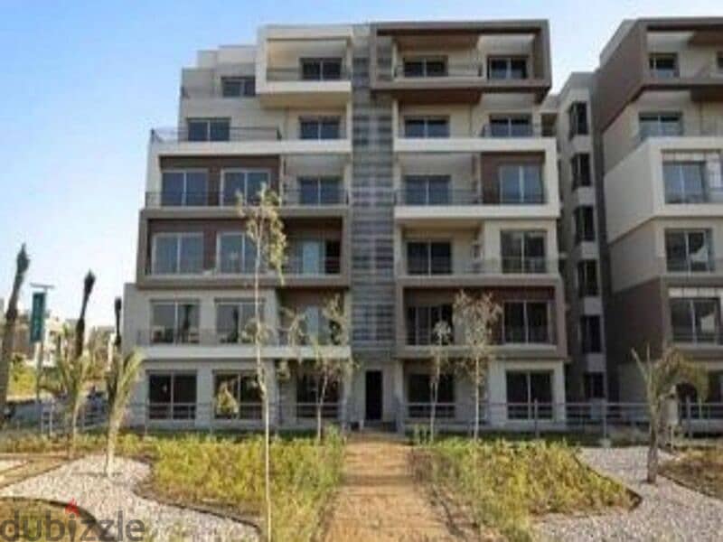 apartment with garden fully finished direct on lagoon , palm hills new cairo cleo 9