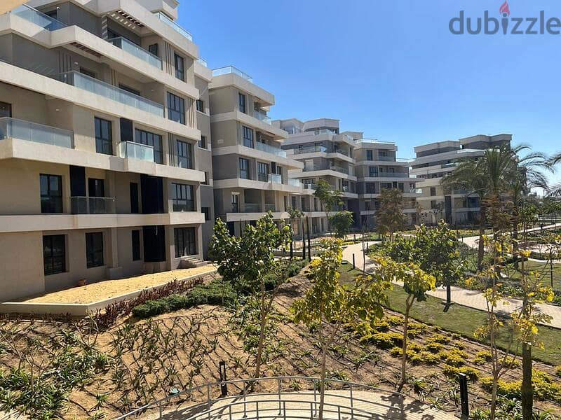 Duplex 319m with garden for sale in Sky Condos | New Cairo 1