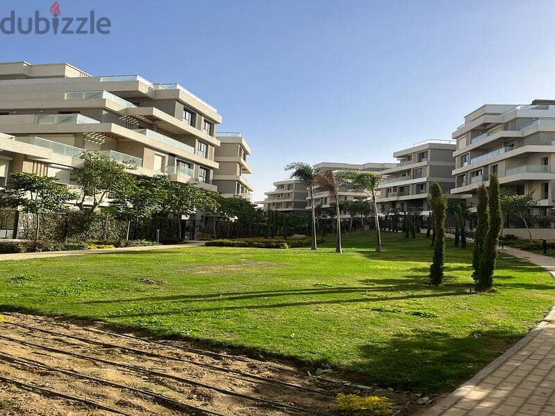 Duplex 319m with garden for sale in Sky Condos | New Cairo 3